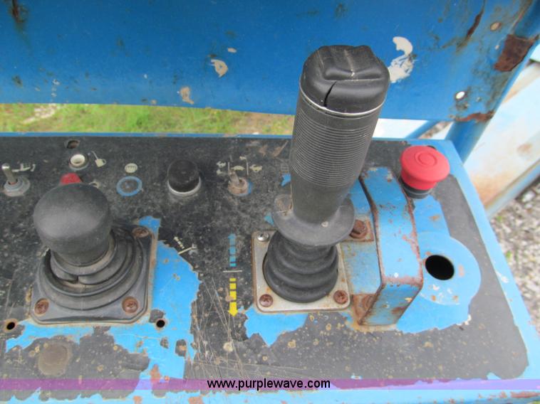 image for item E5599 1994 Genie S60 boom lift