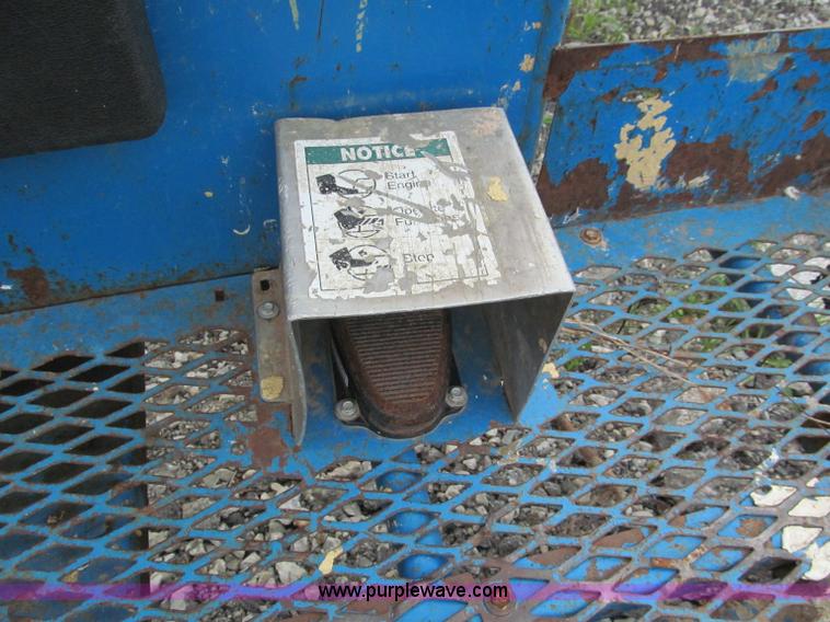 image for item E5599 1994 Genie S60 boom lift