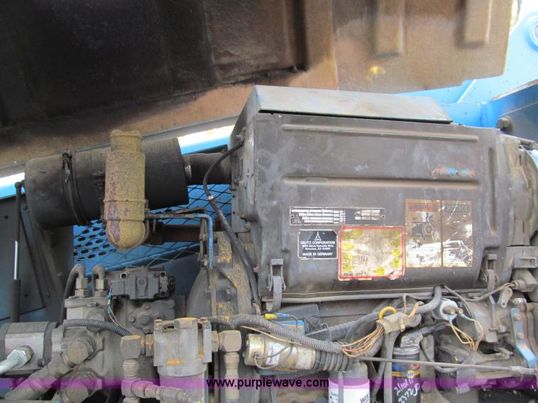 image for item E5599 1994 Genie S60 boom lift