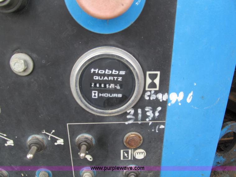 image for item E5599 1994 Genie S60 boom lift