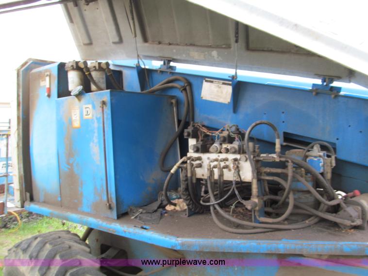 image for item E5599 1994 Genie S60 boom lift