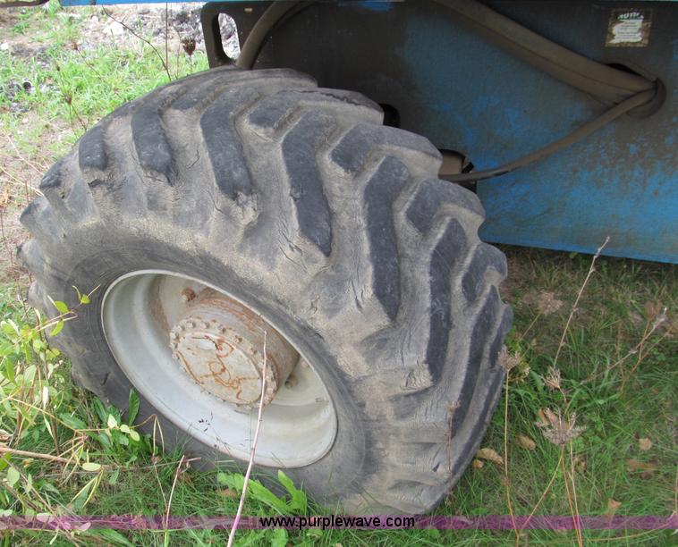 image for item E5599 1994 Genie S60 boom lift