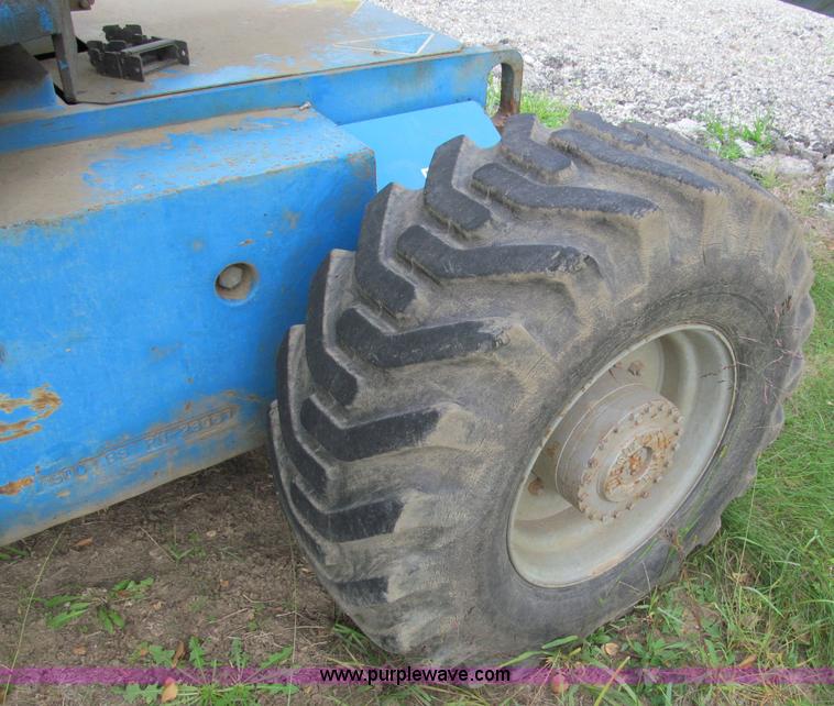 image for item E5599 1994 Genie S60 boom lift