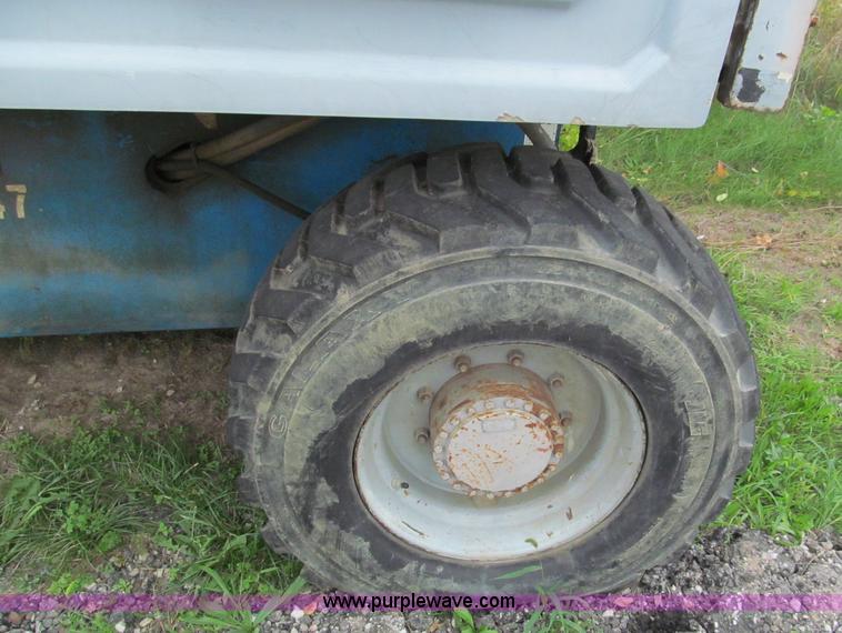 image for item E5599 1994 Genie S60 boom lift