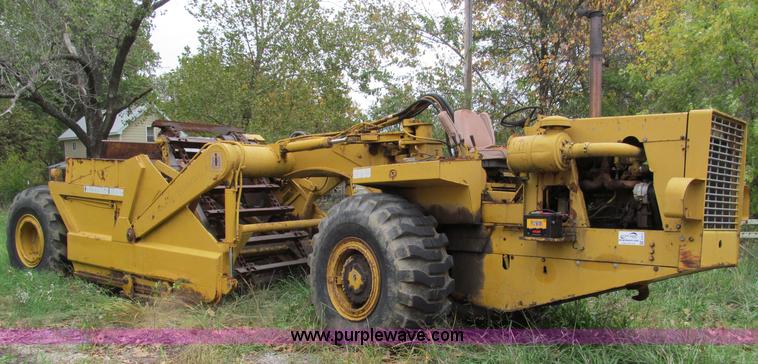 image for item E5612 1969 International E200 Pay Scraper paddle scraper