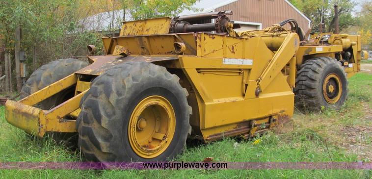 image for item E5612 1969 International E200 Pay Scraper paddle scraper