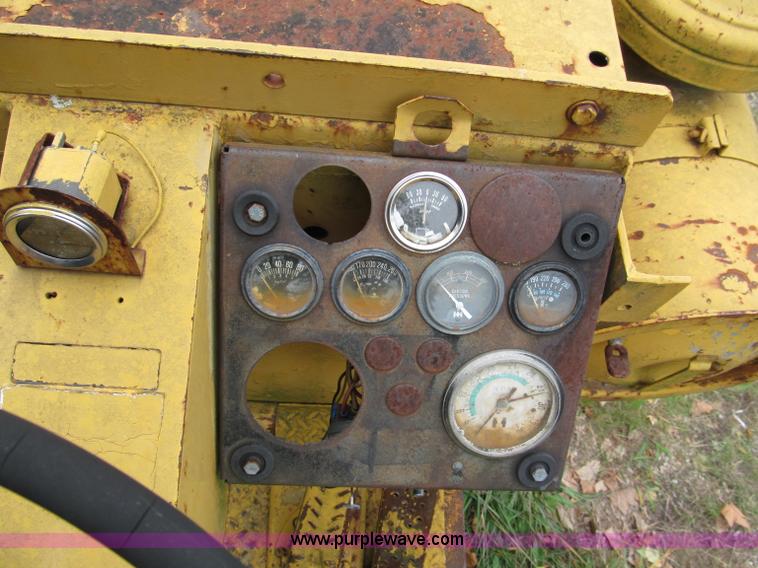 image for item E5612 1969 International E200 Pay Scraper paddle scraper