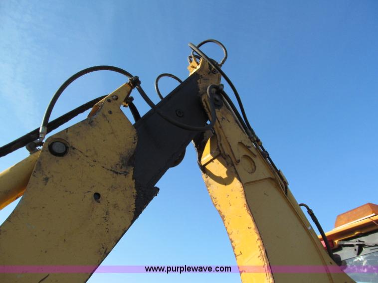 image for item E5643 2003 John Deere 410G backhoe