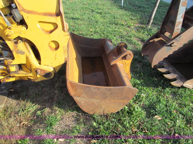 image for item E5643 2003 John Deere 410G backhoe