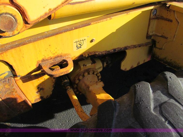image for item E5643 2003 John Deere 410G backhoe