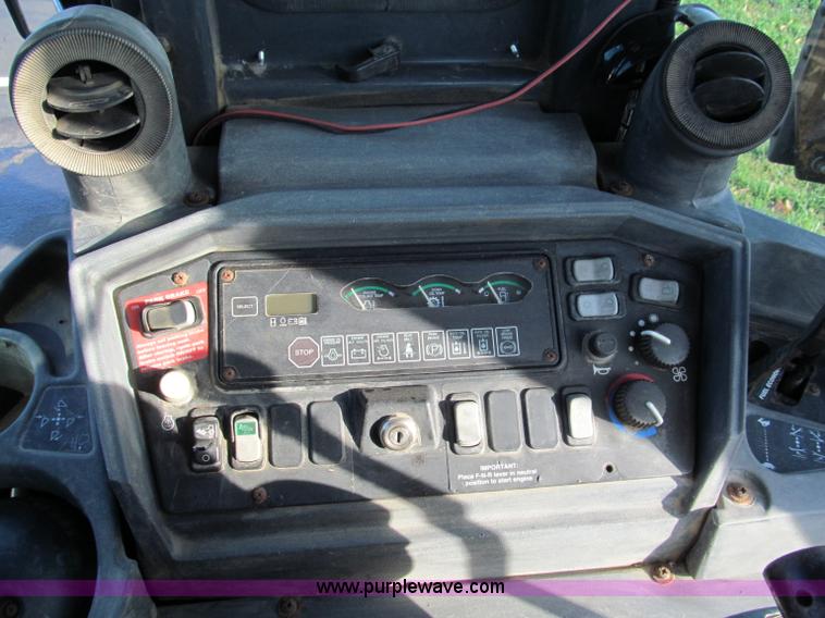 image for item E5643 2003 John Deere 410G backhoe