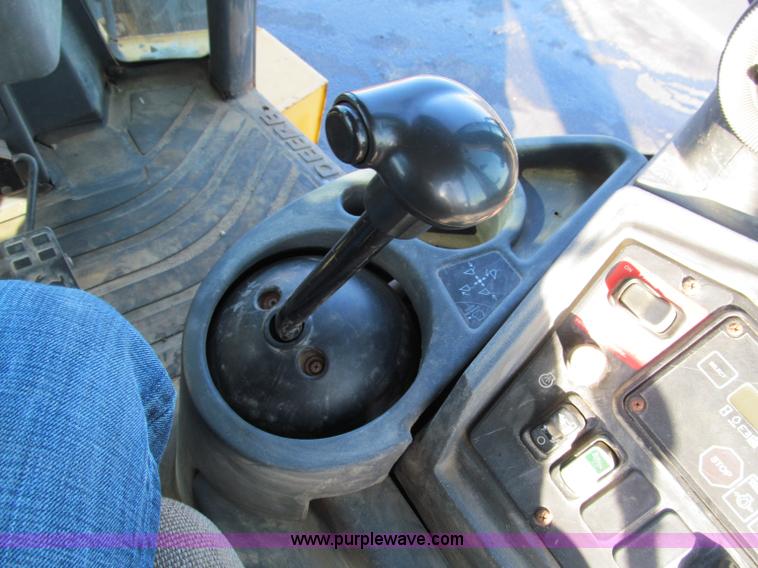 image for item E5643 2003 John Deere 410G backhoe