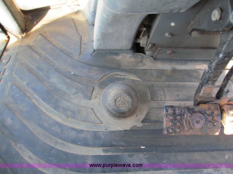 image for item E5643 2003 John Deere 410G backhoe