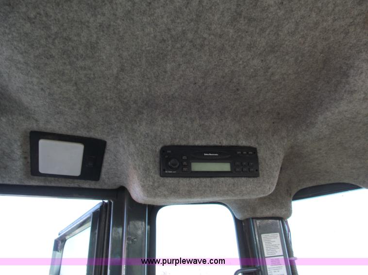 image for item E5643 2003 John Deere 410G backhoe