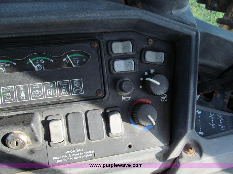 image for item E5643 2003 John Deere 410G backhoe