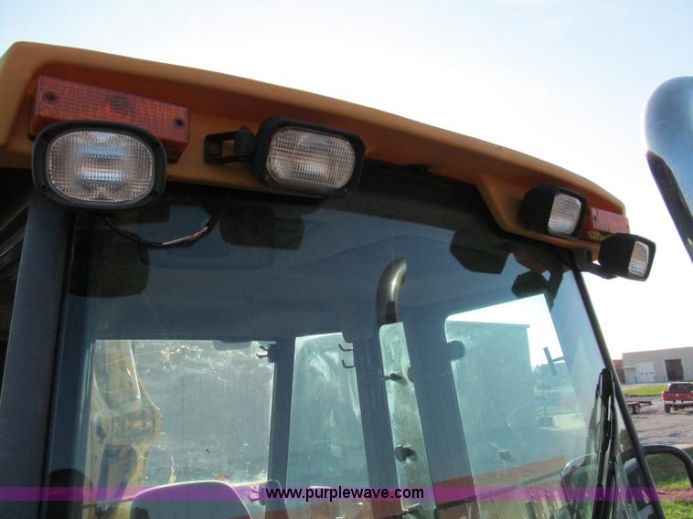 image for item E5643 2003 John Deere 410G backhoe