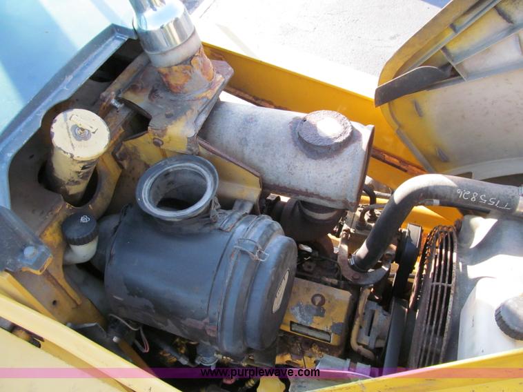 image for item E5643 2003 John Deere 410G backhoe