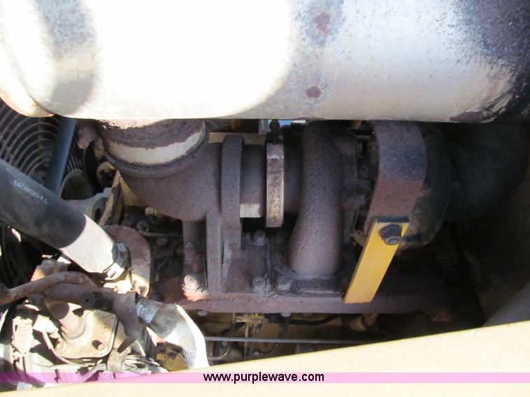 image for item E5643 2003 John Deere 410G backhoe