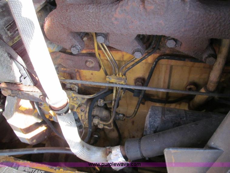 image for item E5643 2003 John Deere 410G backhoe