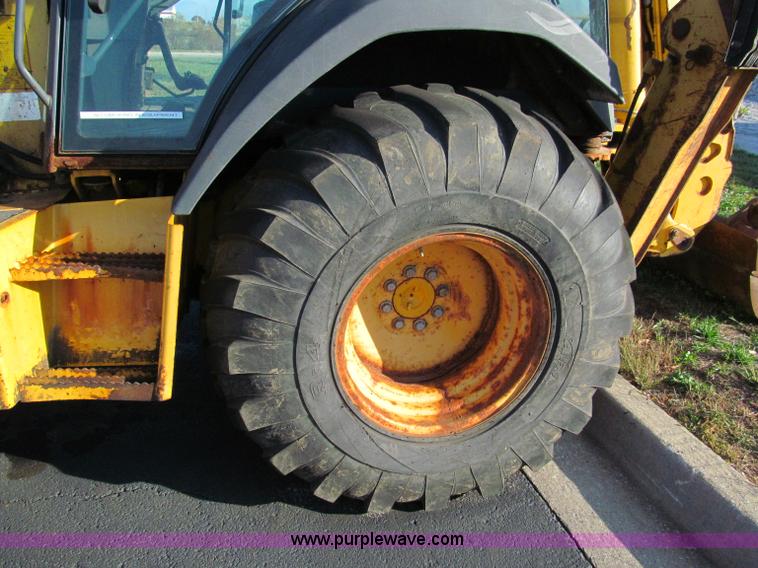 image for item E5643 2003 John Deere 410G backhoe