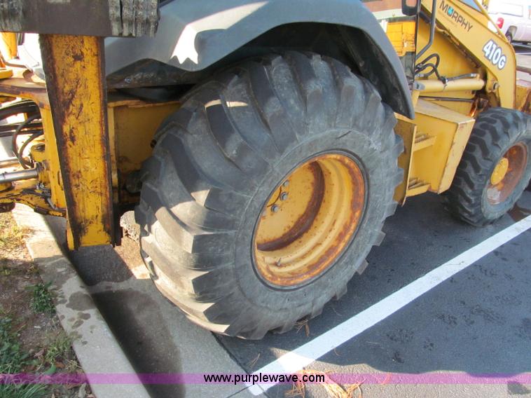 image for item E5643 2003 John Deere 410G backhoe