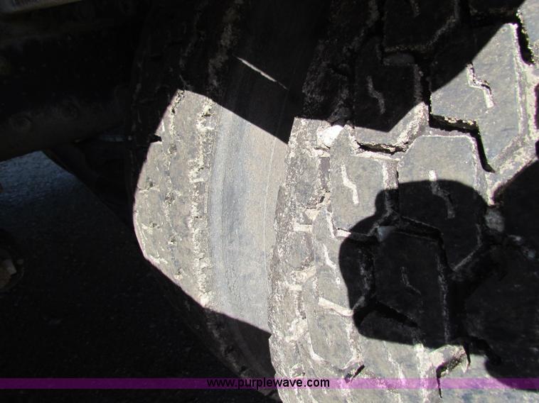 image for item E8142 1995 Volvo White GMC WCA semi truck