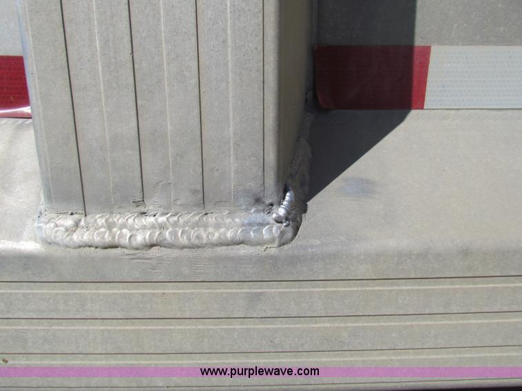 image for item E8143 1994 Travis T-102 end dump trailer