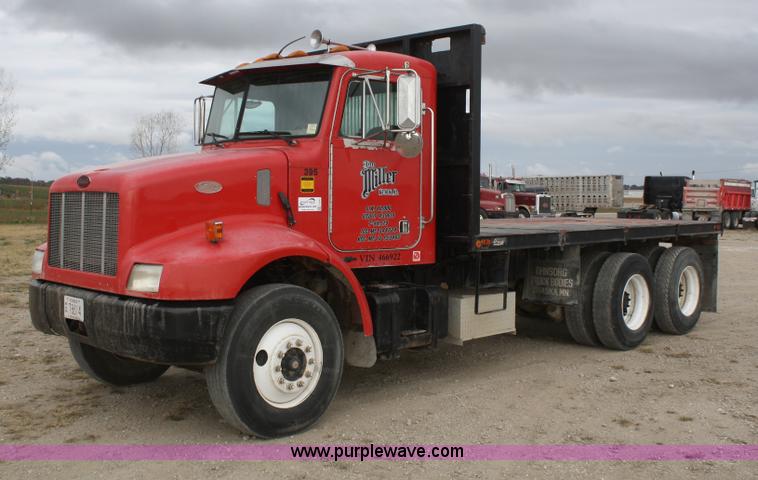 image for item F2643 1999 Peterbilt 330 flatbed semi truck