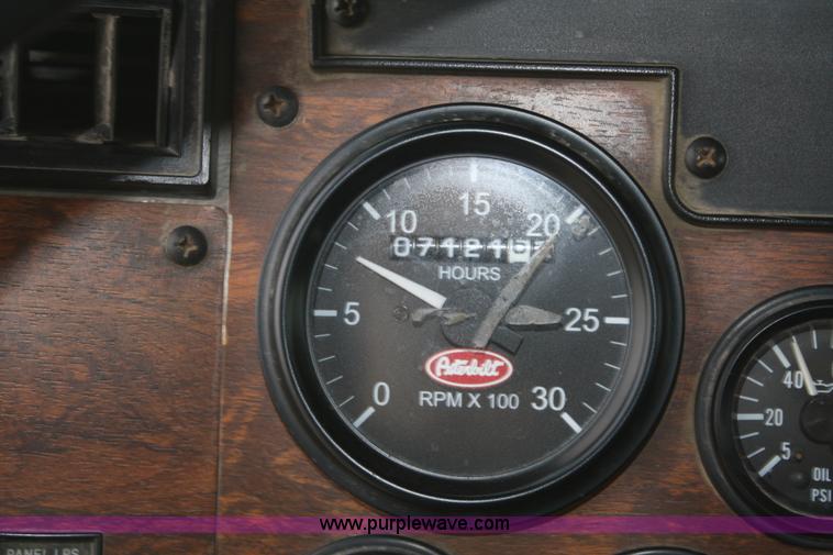 image for item F2643 1999 Peterbilt 330 flatbed semi truck