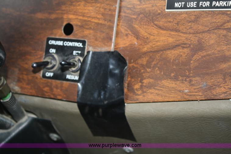 image for item F2643 1999 Peterbilt 330 flatbed semi truck