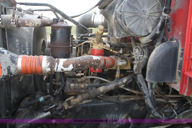 image for item F2643 1999 Peterbilt 330 flatbed semi truck