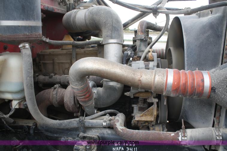 image for item F2643 1999 Peterbilt 330 flatbed semi truck