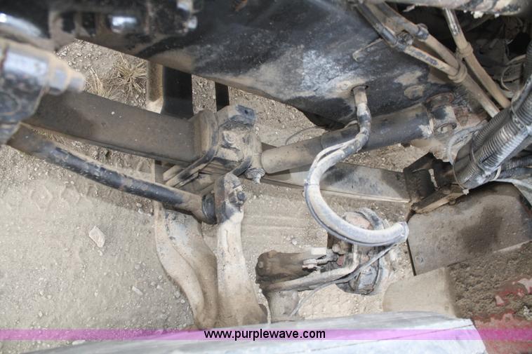 image for item F2643 1999 Peterbilt 330 flatbed semi truck