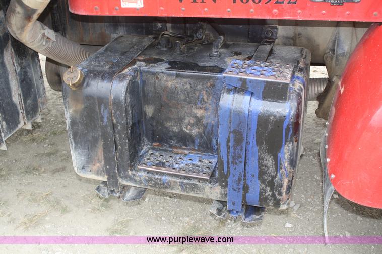 image for item F2643 1999 Peterbilt 330 flatbed semi truck