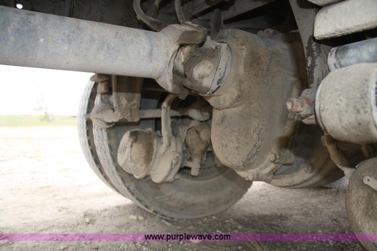 image for item F2643 1999 Peterbilt 330 flatbed semi truck