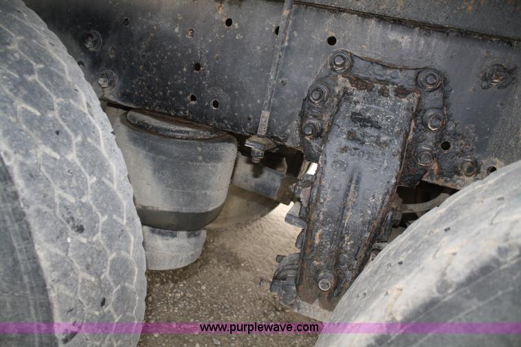 image for item F2643 1999 Peterbilt 330 flatbed semi truck