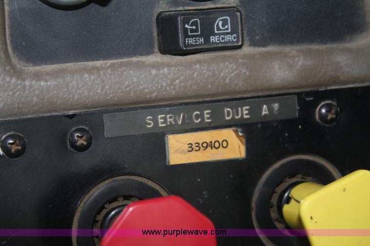 image for item F2643 1999 Peterbilt 330 flatbed semi truck