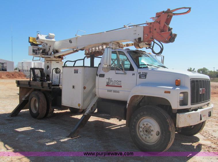 image for item F3053 2000 GMC C7500 digger derrick truck