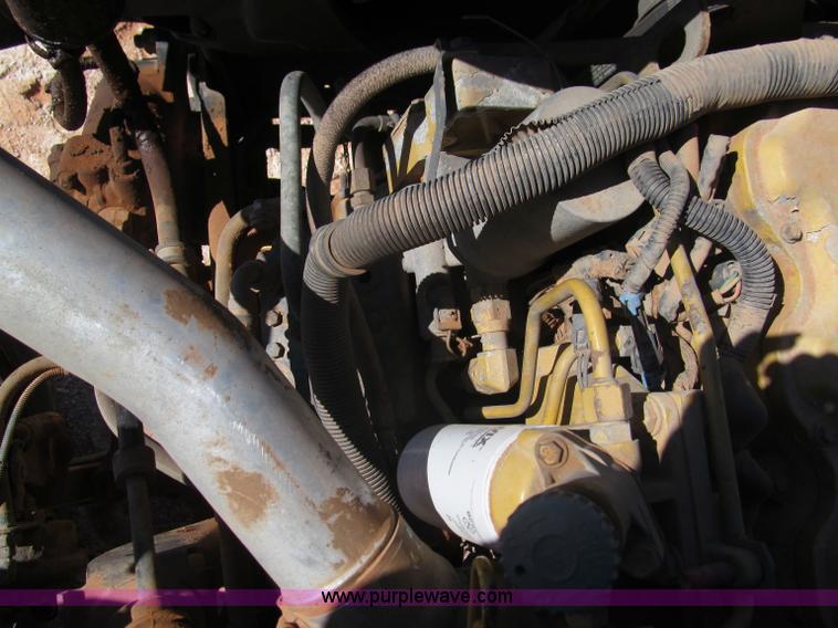 image for item F3053 2000 GMC C7500 digger derrick truck