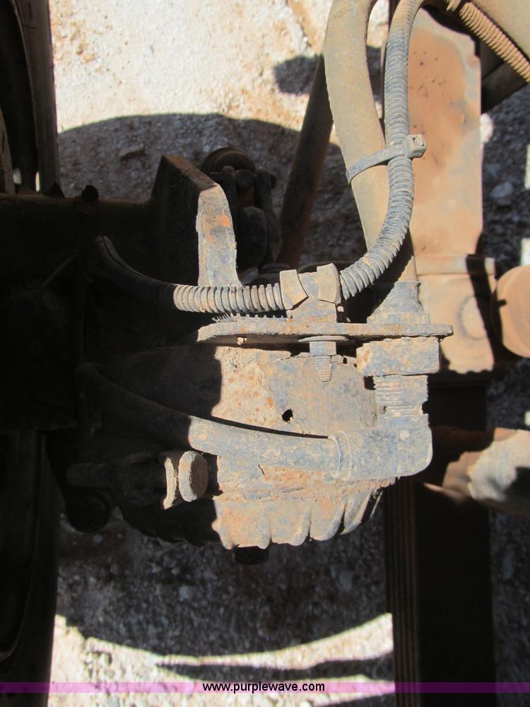 image for item F3053 2000 GMC C7500 digger derrick truck