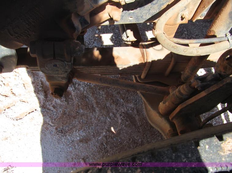 image for item F3053 2000 GMC C7500 digger derrick truck