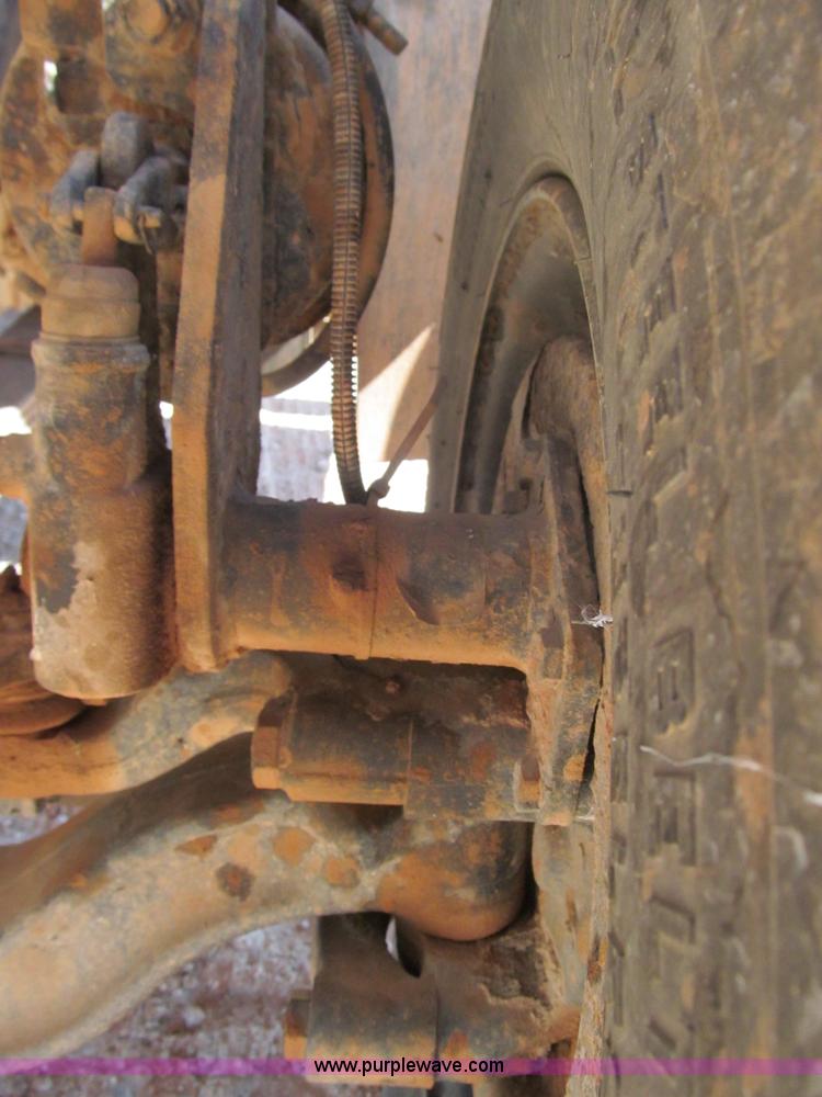 image for item F3053 2000 GMC C7500 digger derrick truck