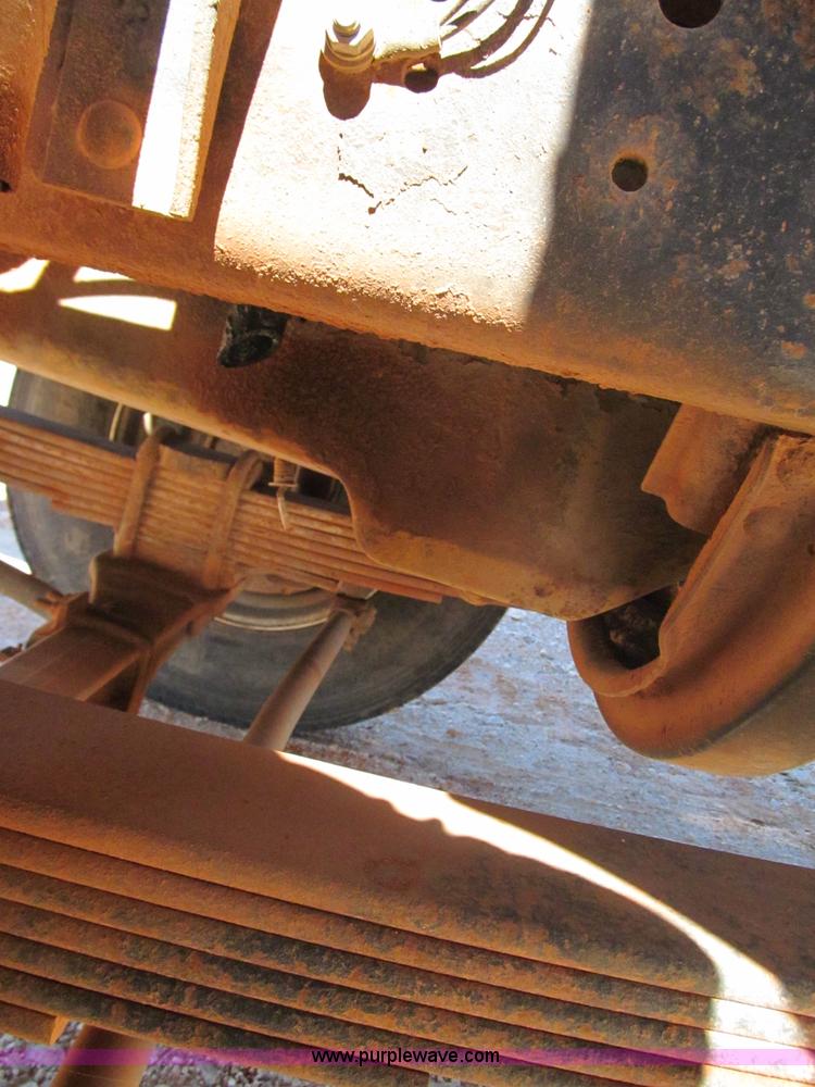 image for item F3053 2000 GMC C7500 digger derrick truck