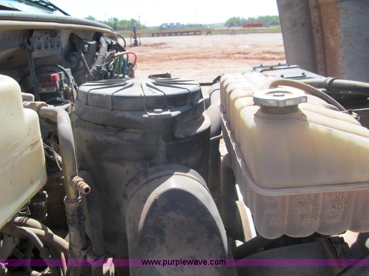 image for item F3053 2000 GMC C7500 digger derrick truck