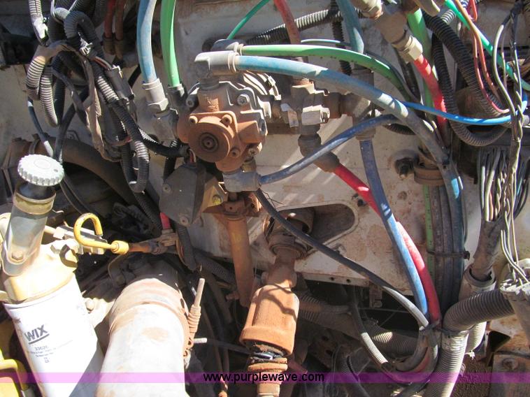 image for item F3053 2000 GMC C7500 digger derrick truck