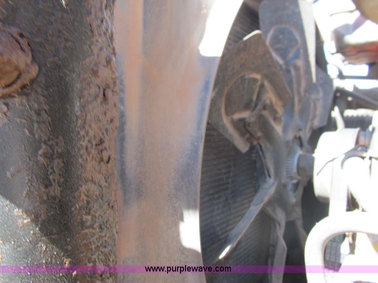 image for item F3053 2000 GMC C7500 digger derrick truck