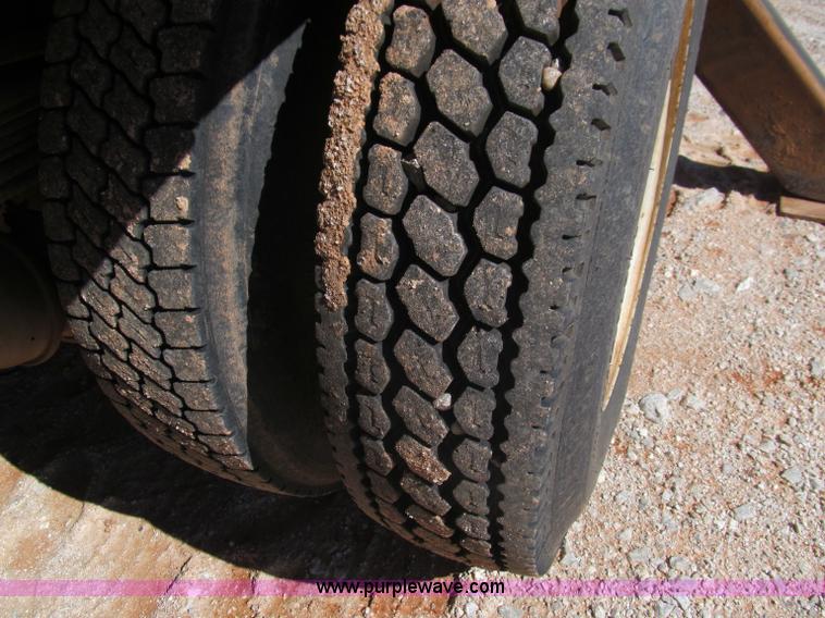 image for item F3053 2000 GMC C7500 digger derrick truck