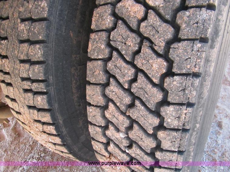 image for item F3053 2000 GMC C7500 digger derrick truck