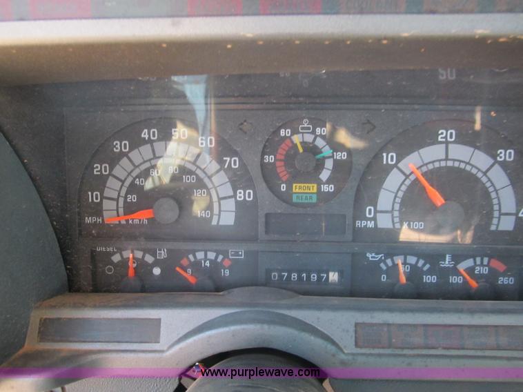 image for item F3053 2000 GMC C7500 digger derrick truck