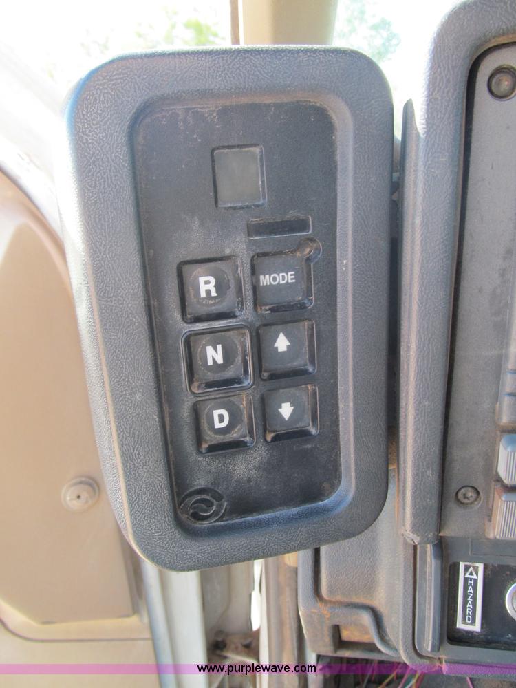 image for item F3053 2000 GMC C7500 digger derrick truck